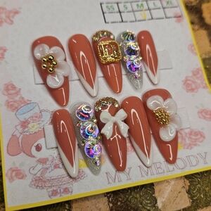 Pink and White Nail Set with Gold Accents